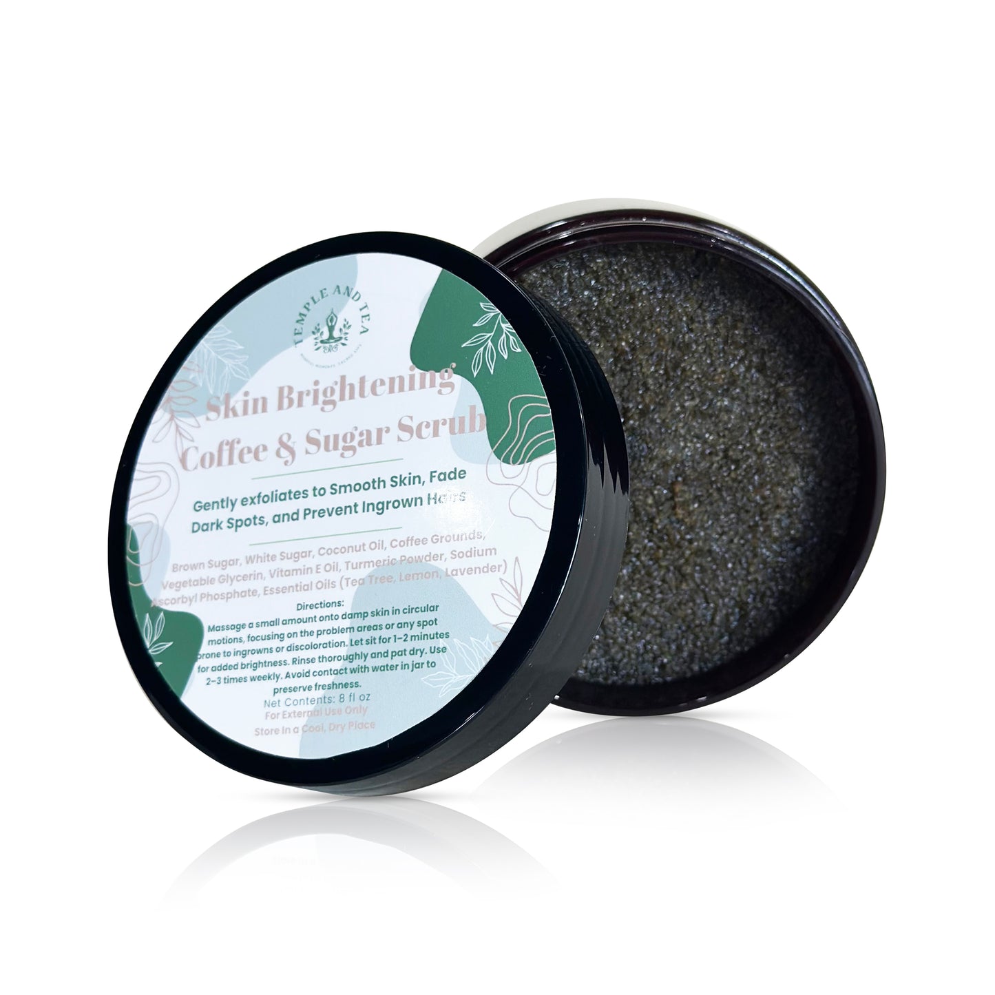 Open container of skin brightening coffee and sugar scrub